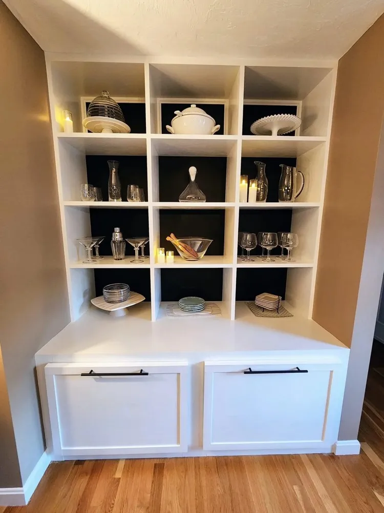 Custom built-in shelving and drawers in a renovated closet