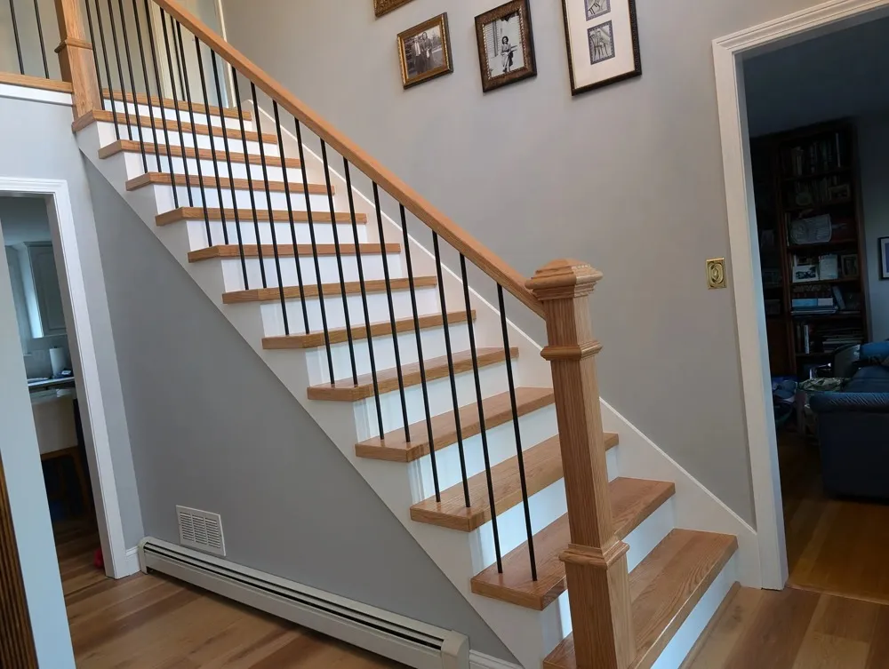 New staircase with wood treads, posts and balusters