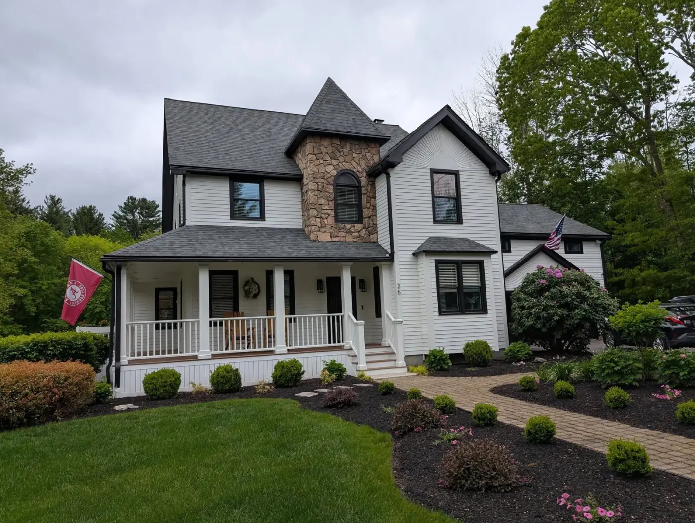 White house with black trim after exterior painting